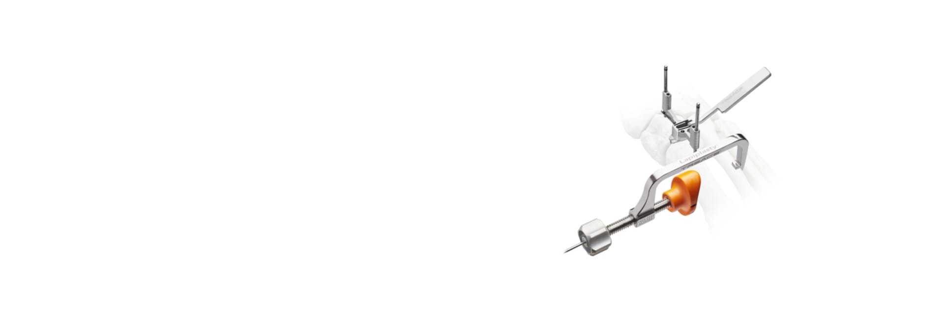 Surgical instrument with a metallic rod and orange tip, set against a plain white background.